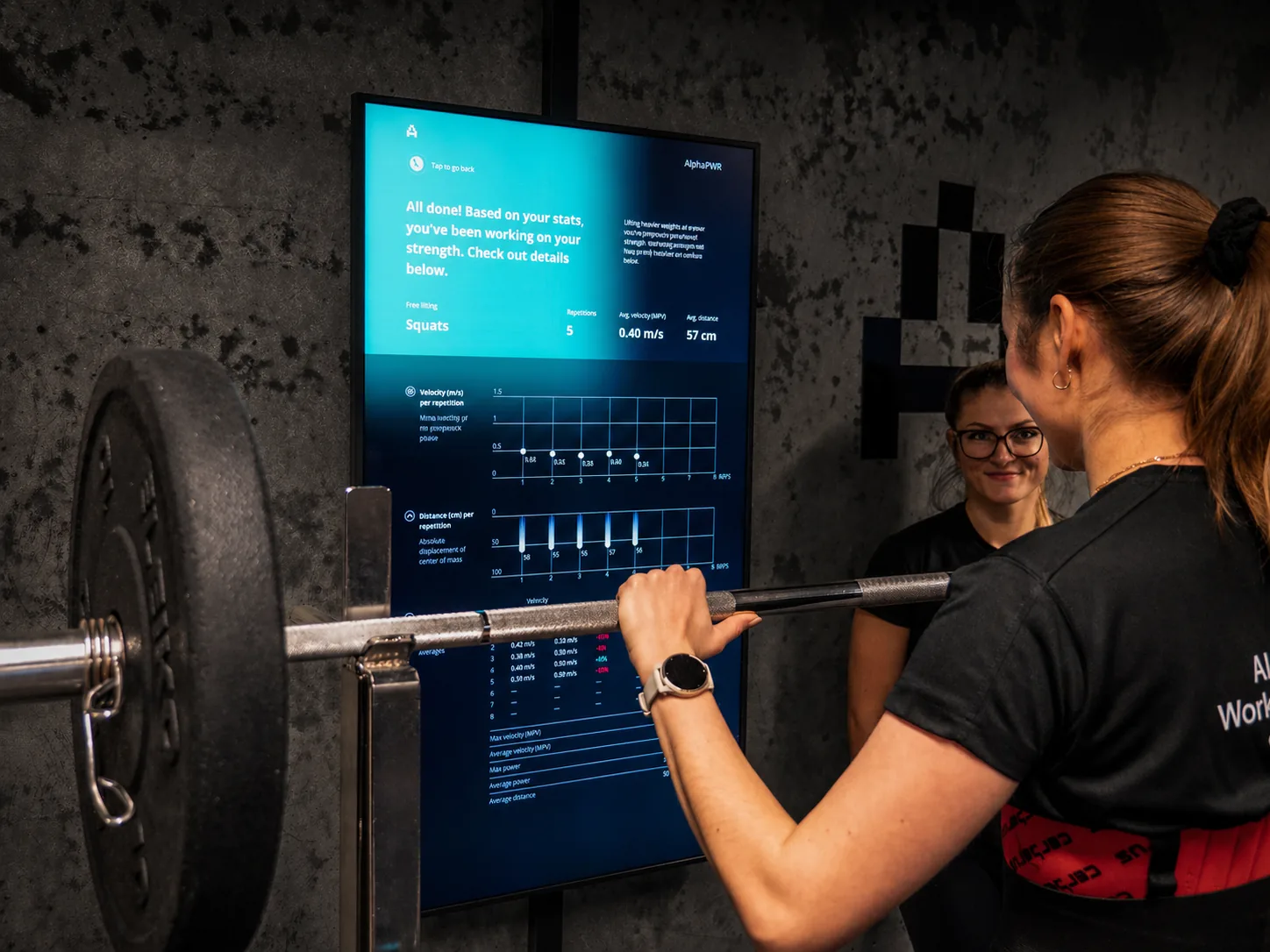 Guided exercise with live Alphatek feedback visible on screen.