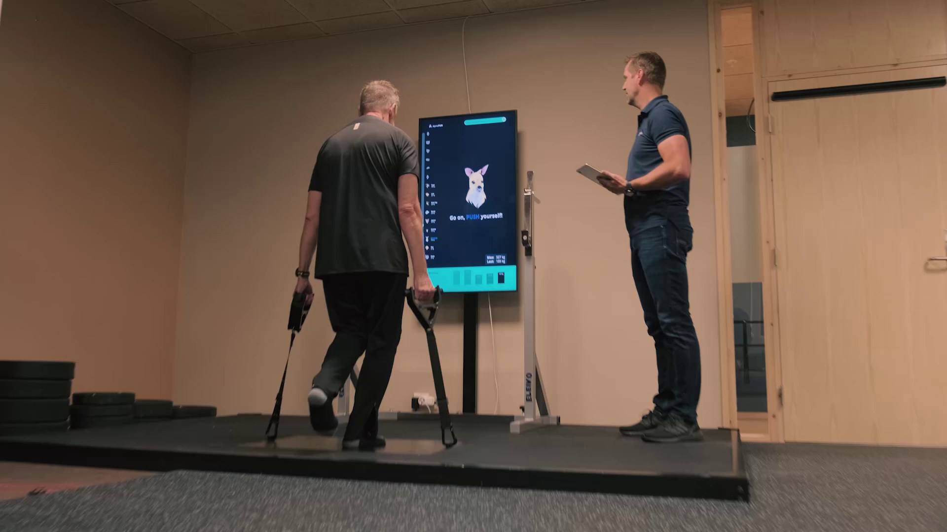A professional guides an adult through an activity with the result visible.